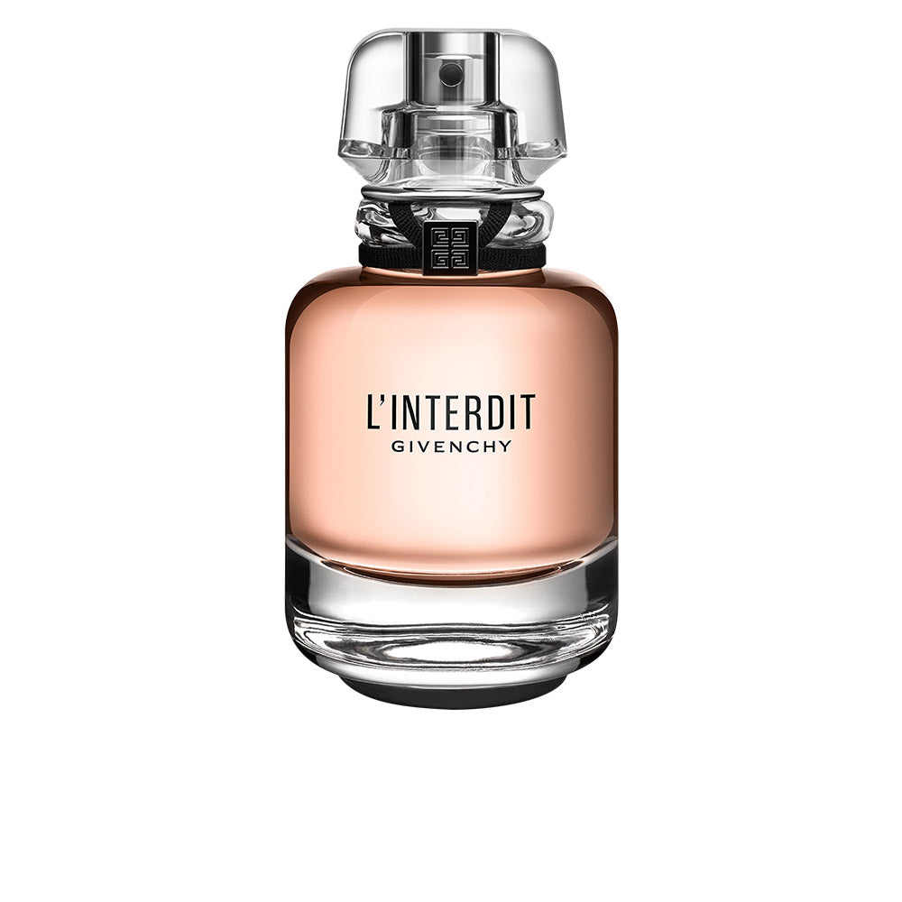 50 ml crystal perfume bottle with black ribbon, floral-woody fragrance