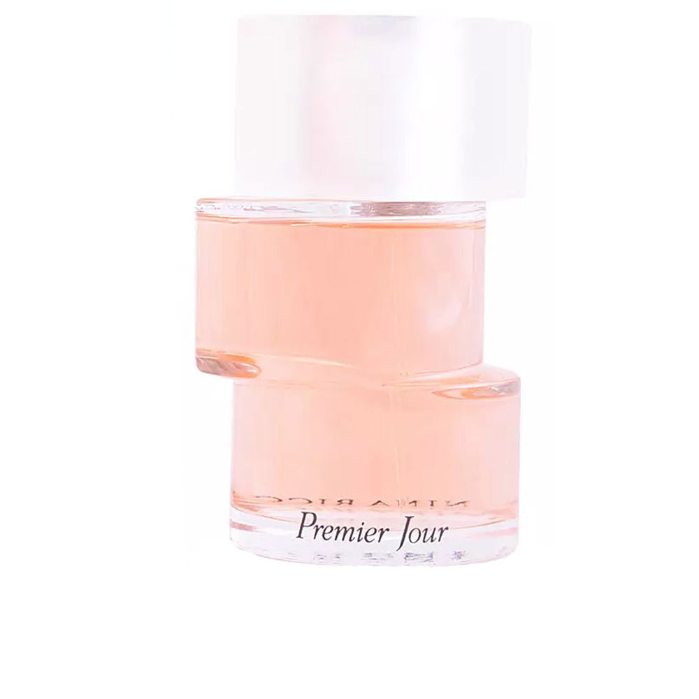 Glass perfume bottle with pale liquid, 100 ml, floral fragrance