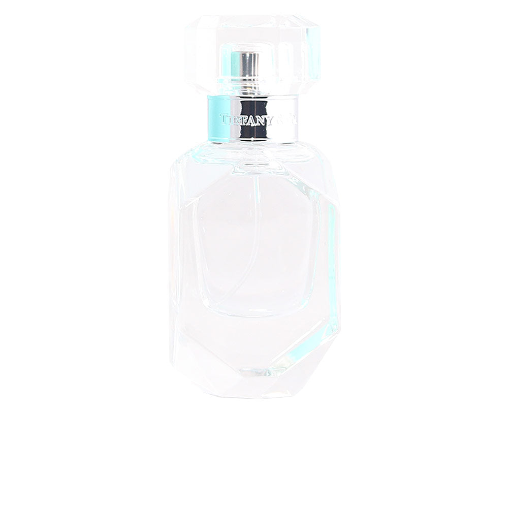 50 ml clear glass perfume bottle with pale floral eau, minimalist cap
