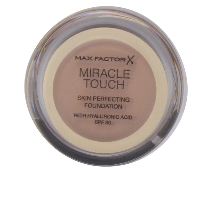 Compact solid-to-liquid foundation in Warm Almond, 12 g, SPF 30