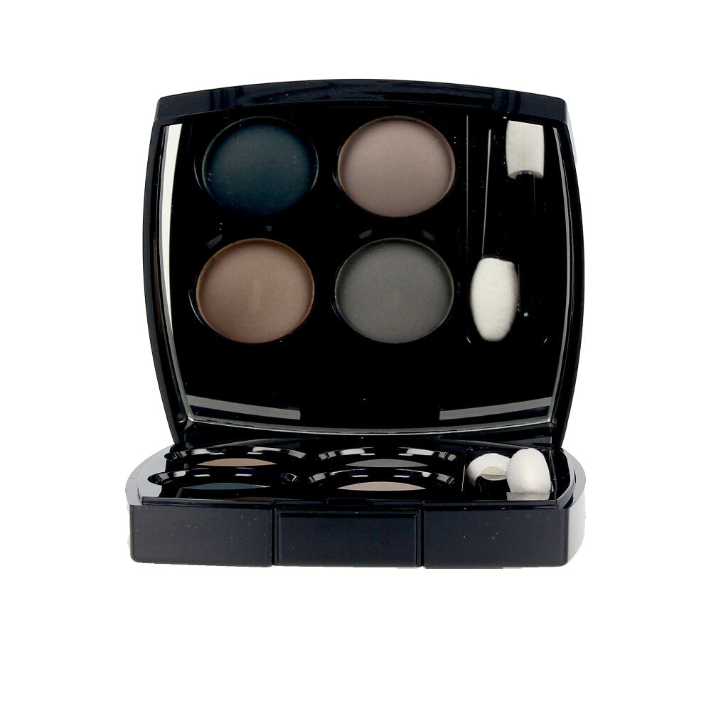 Compact eyeshadow palette with four blue-toned shades, matte and metallic finishes