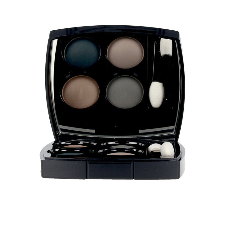 Compact eyeshadow palette with four blue-toned shades, matte and metallic finishes