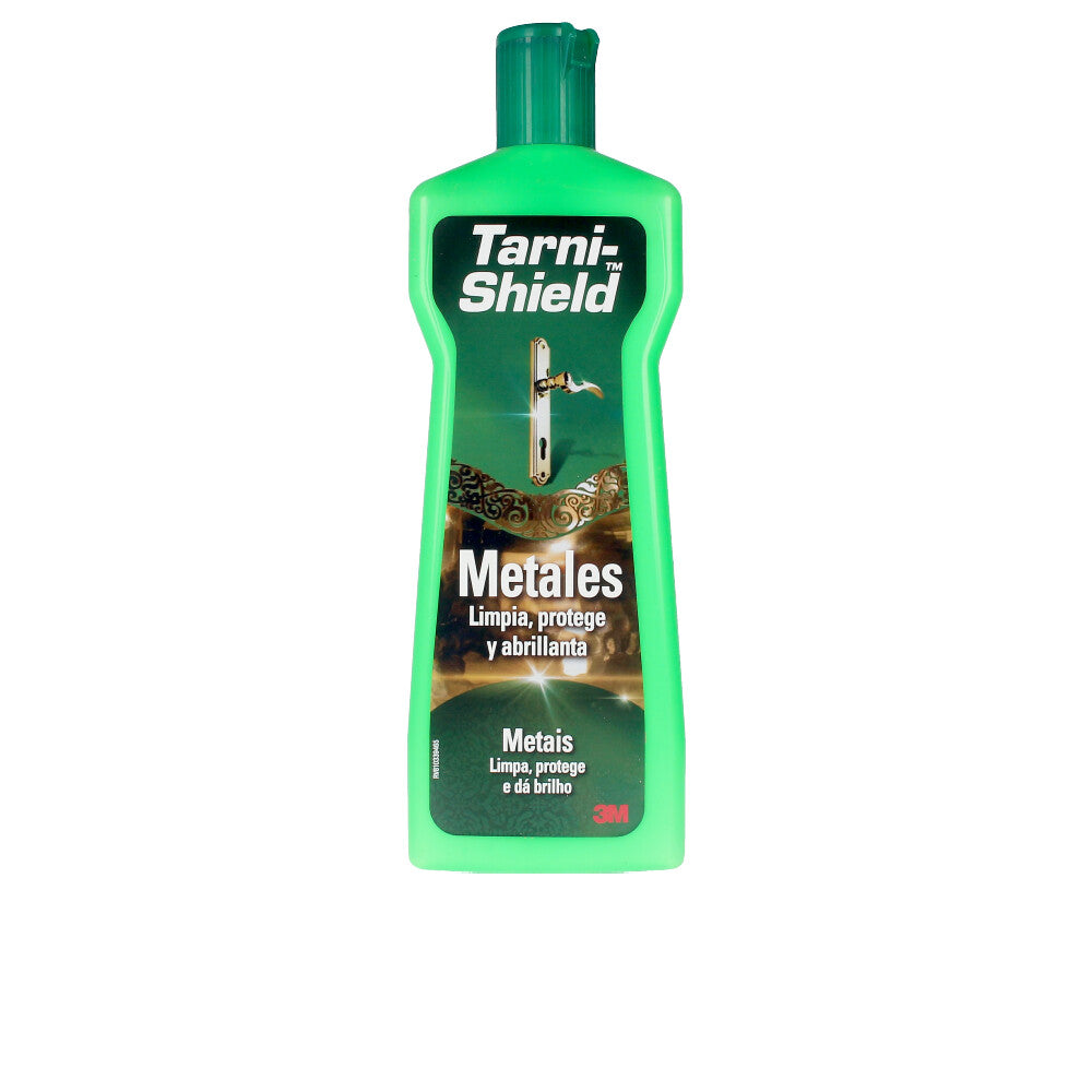 Bottle of Tarni-Shield metal care liquid beside polished brass doorknob on linen
