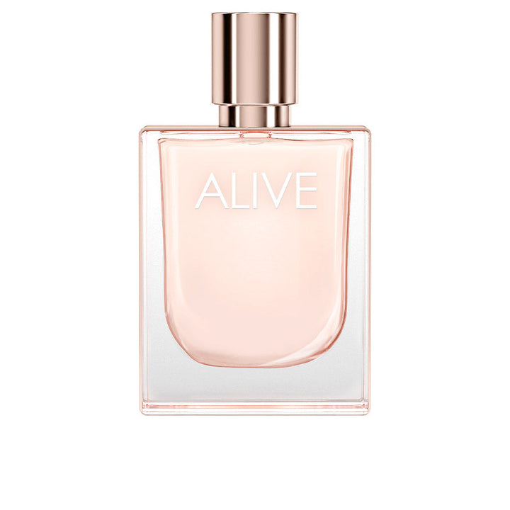 Clear crystal bottle of pale pink floral‑woody Eau de Toilette, 80 ml, rose‑gold detail