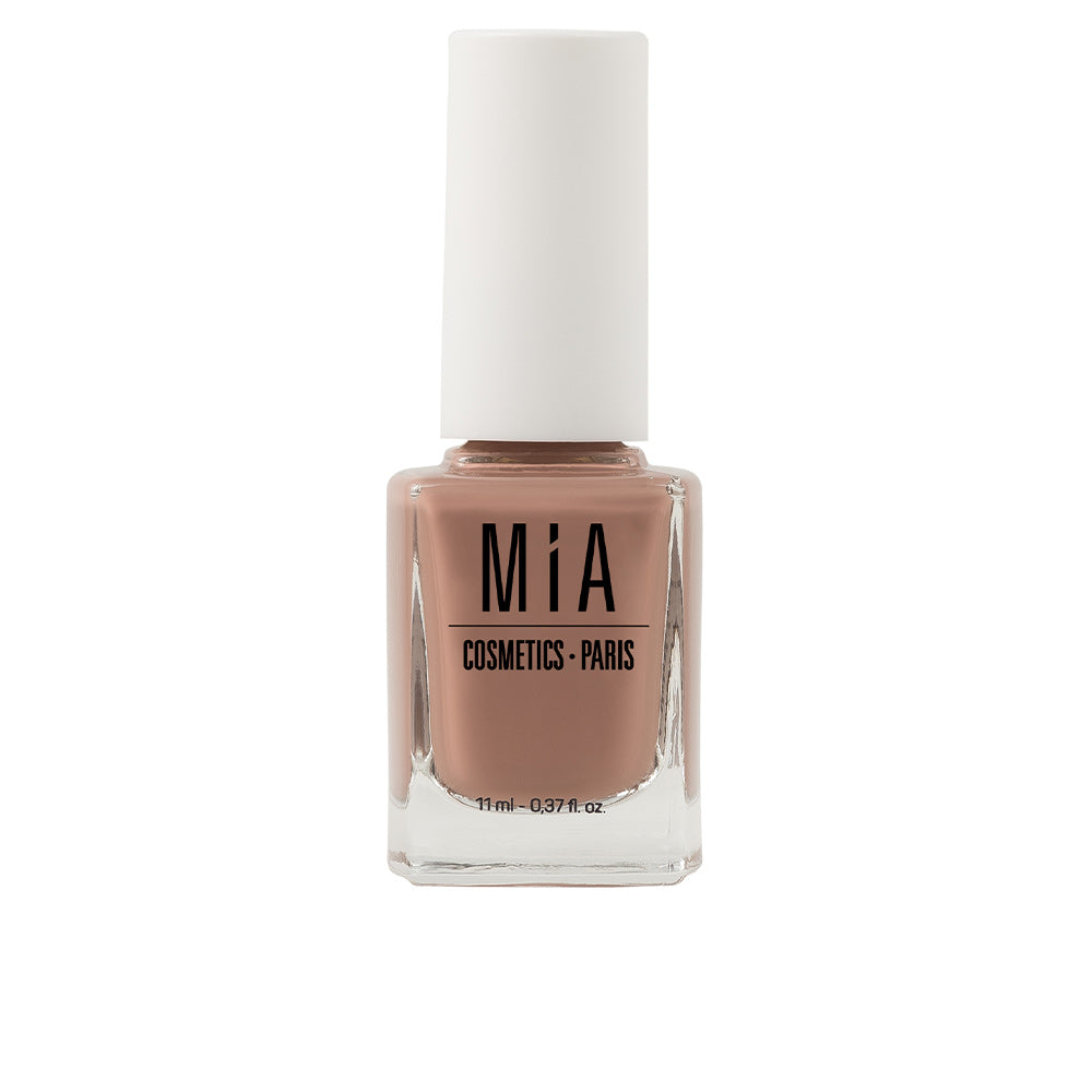 11 ml bottle of cinnamon nude nail polish, glossy finish