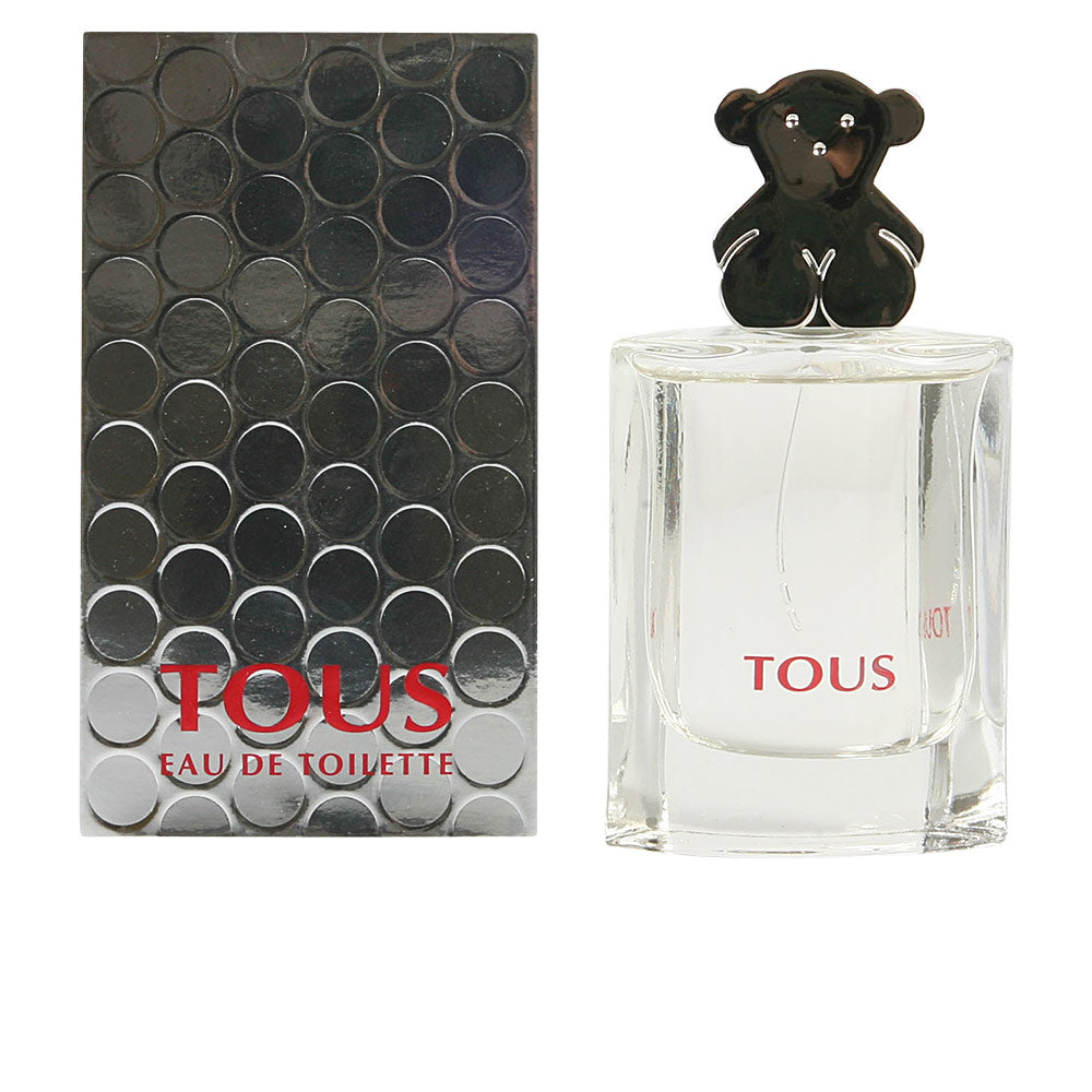 Clear 90 ml floral eau de toilette bottle with decorative cap, 2002 fragrance