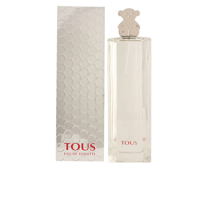 Clear 90 ml floral eau de toilette bottle with decorative cap, 2002 fragrance