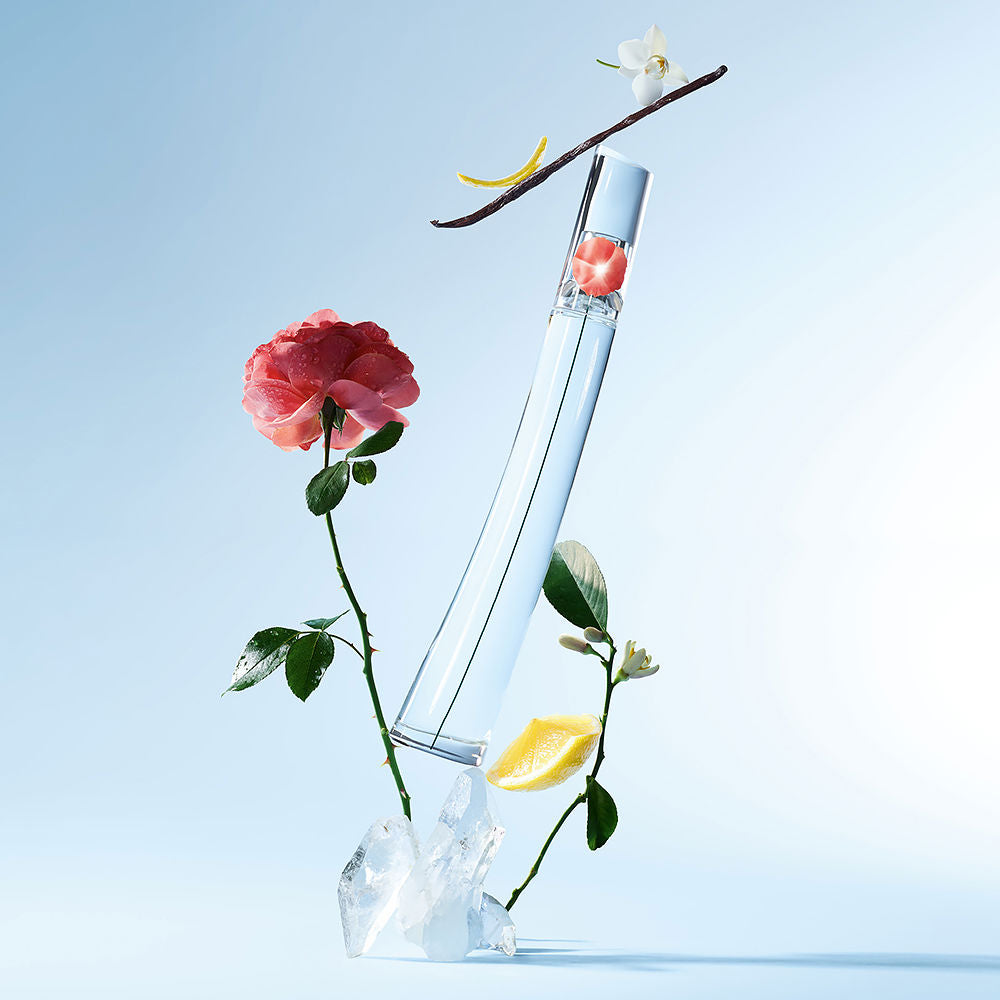 30 ml poppy-inspired perfume bottle; red-accented glass; floral eau de toilette