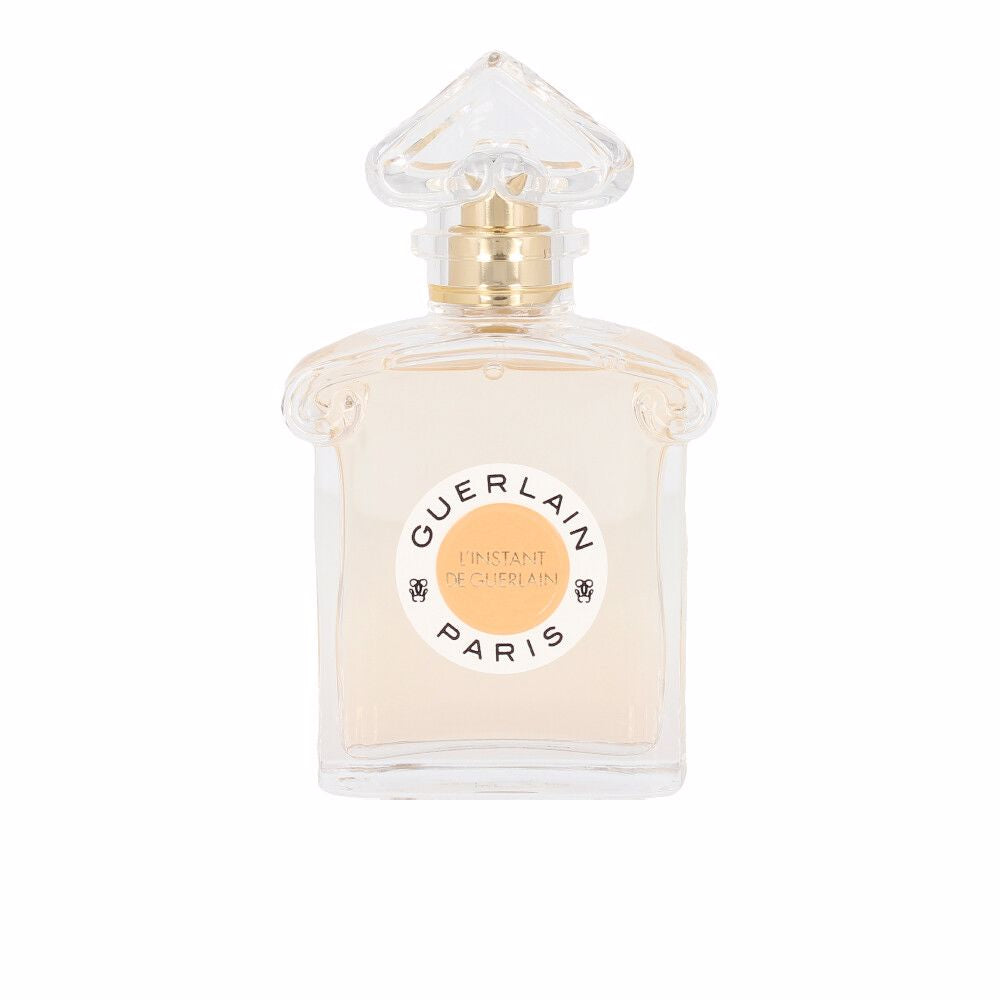 Glass perfume bottle, inverted‑heart design, amber‑tinted liquid, 75 ml