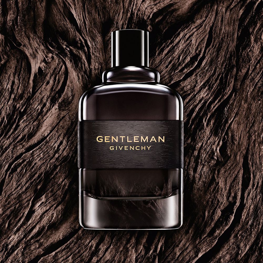 100 ml dark-banded glass bottle of woody floral eau de parfum for Man