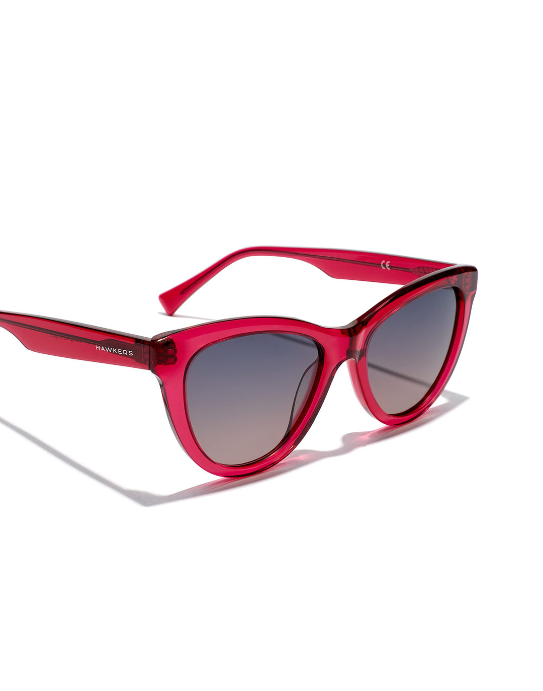 Unisex cat‑eye sunglasses in translucent cherry acetate with grey‑to‑pink gradient lenses