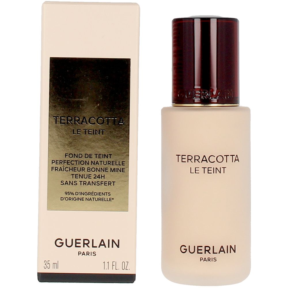 Frosted glass foundation bottle with dark brown embossed cap and gold-label rectangular box, Guerlain