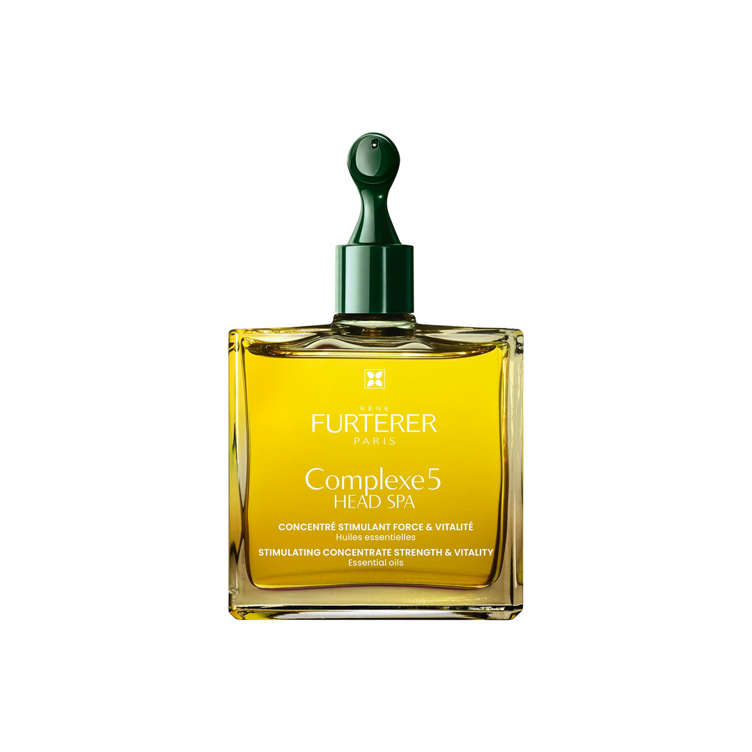 50 ml amber bottle of pre‑shampoo scalp oil with botanical label