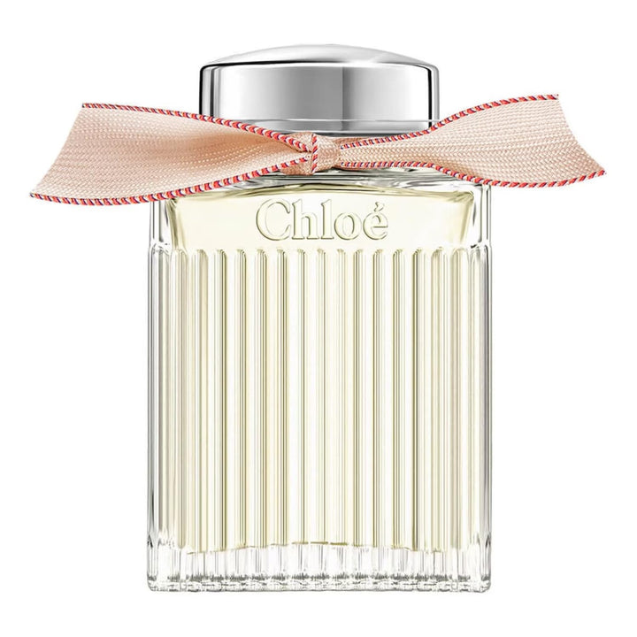 100 ml glass perfume bottle with beige ribbon and silver cap, floral scent