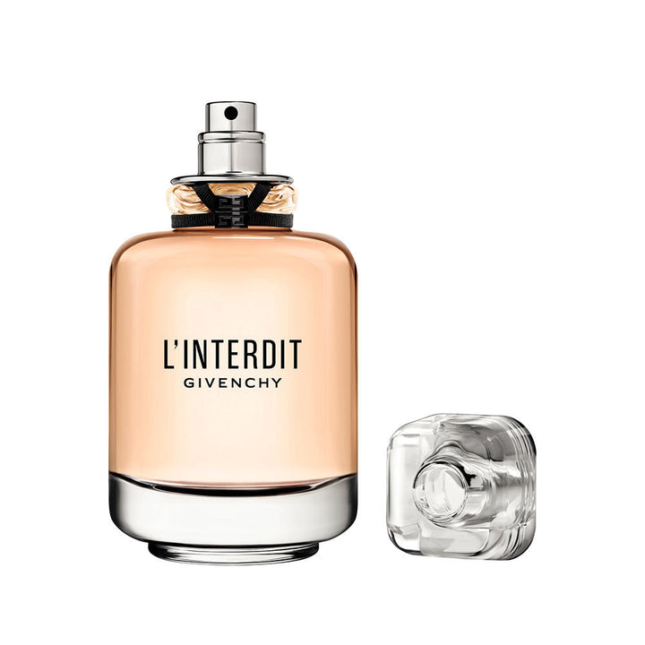 Heavy glass perfume bottle with black ribbon, floral-woody Eau de Parfum for Women