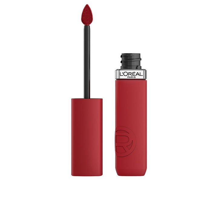 Tube of matte liquid lipstick in muted berry shade with doe-foot applicator