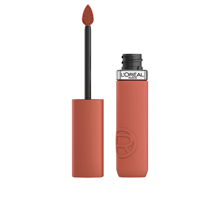 Liquid matte lipstick tube and applicator, muted warm pink shade, Unisex