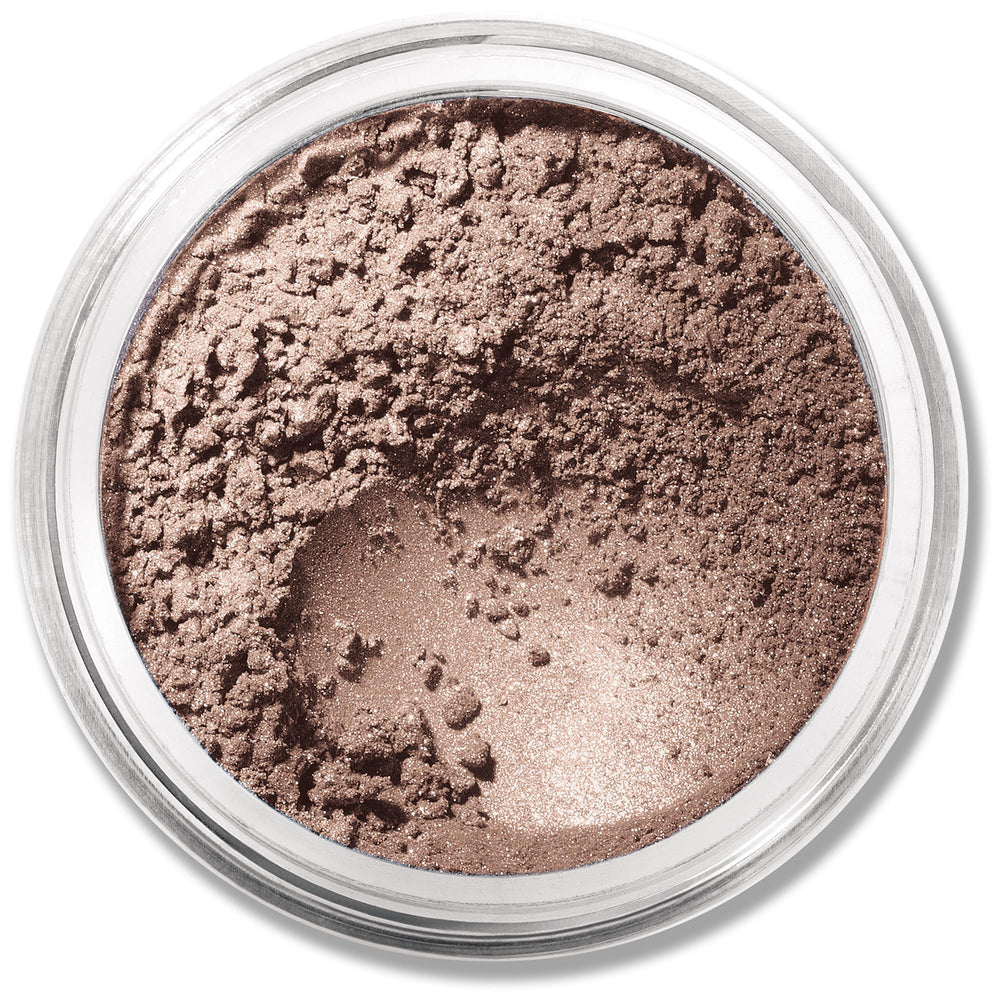 Single jar of Celestine loose mineral eye shadow, pale shimmering blue powder