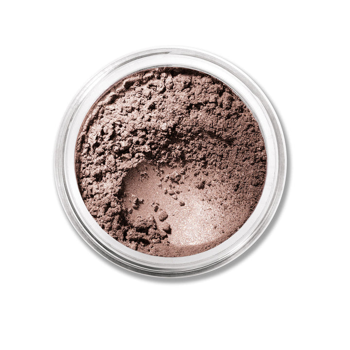 Loose mineral eyeshadow jar in Queen Tiffany, luminous blue-green shimmer