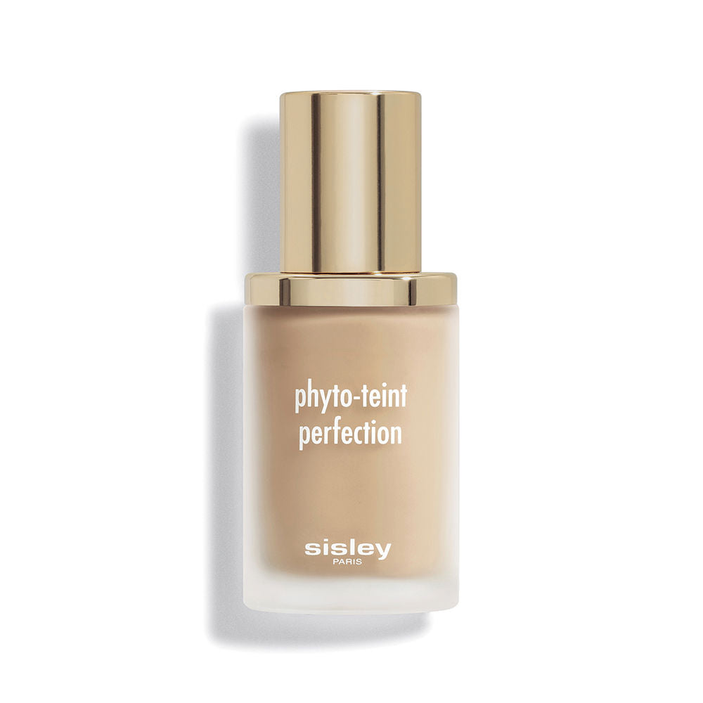Glass liquid foundation bottle in beige with frosted finish, gold metallic cap, minimalist white print — Sisley