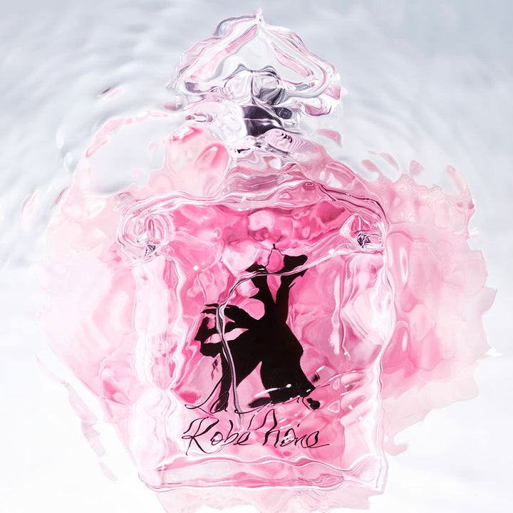 Clear glass 75 ml perfume bottle with blue liquid and inverted‑heart cap