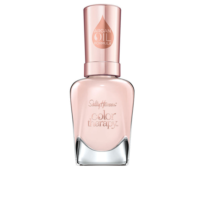 Small bottle of sheer pink nail polish with argan oil, 14.7 ml