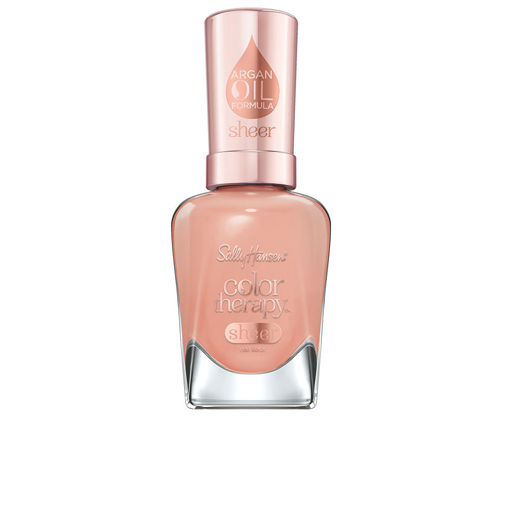 Bottle of sheer pink nail polish with argan oil, 14.7 ml, named Pink Moon