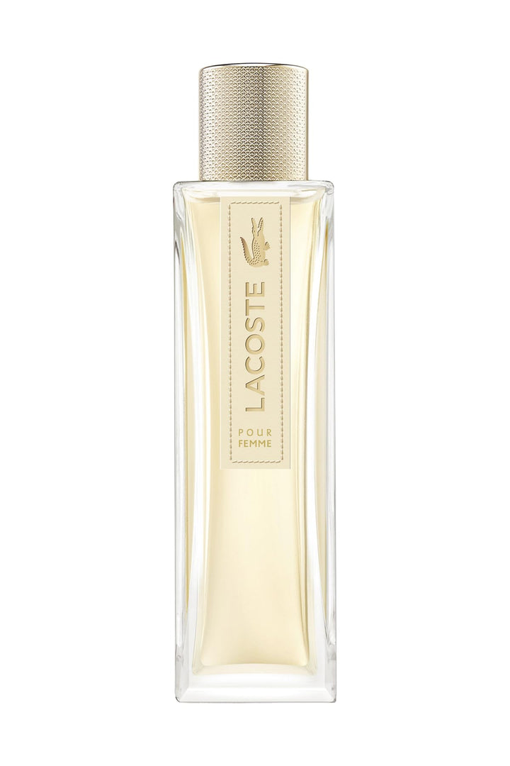 Elegant Lacoste Pour Femme perfume bottle against a soft neutral backdrop