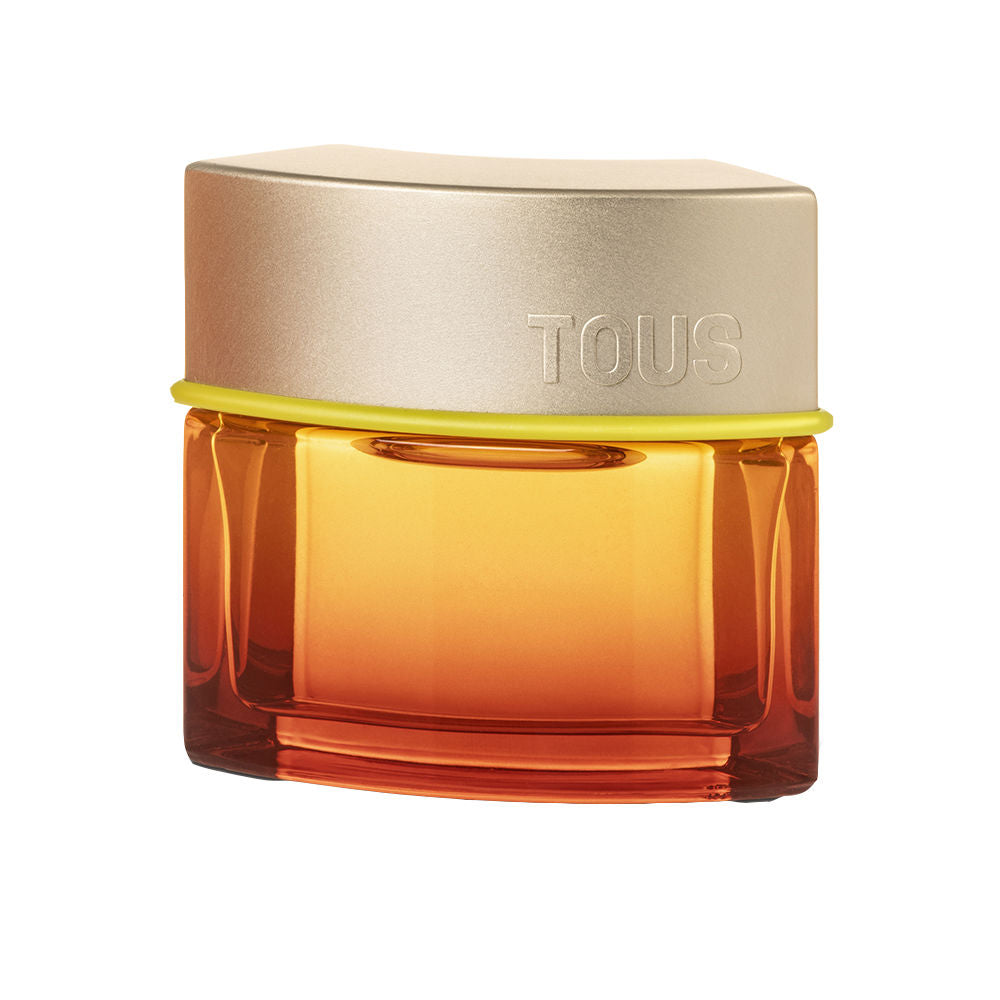 Tous Man Spritz bottle with red-to-orange gradient and gold cap with lime accent