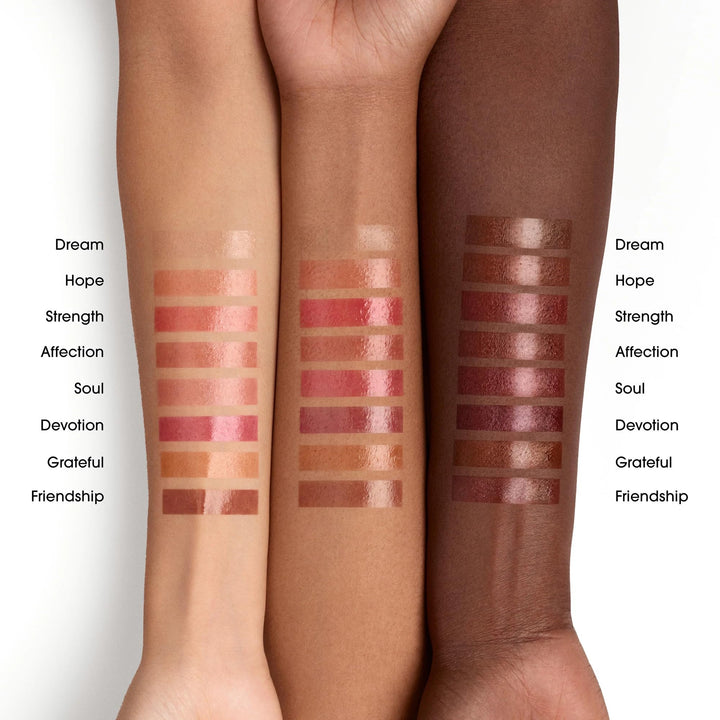Bare Minerals hydrating satin lip gloss in clear tube with doe-foot applicator showing glossy, sheer finish