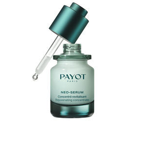 Glass dropper bottle of Neo-Serum with soft golden liquid and minimalist label, Payot branding visible
