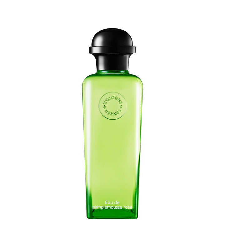 Hermès Glass perfume bottle with pale pink liquid, minimalist label and brushed silver cap