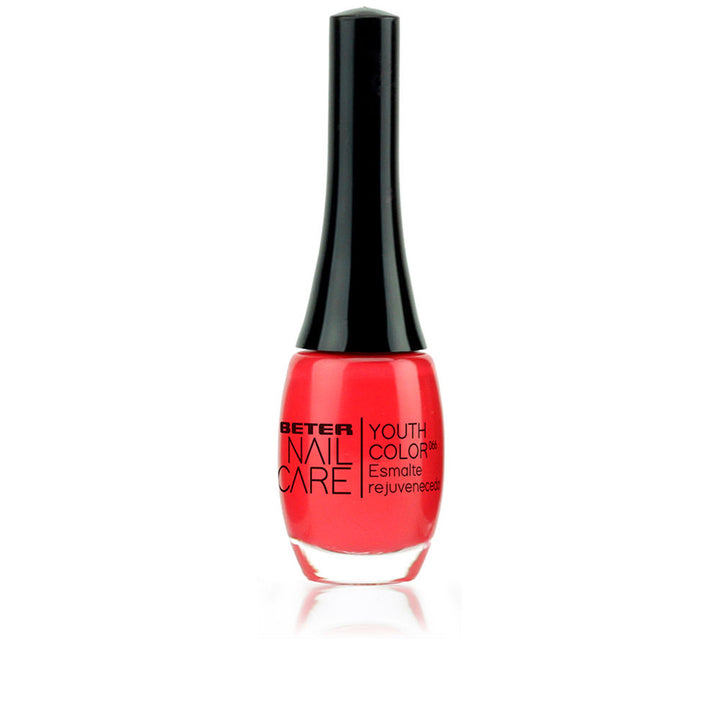 11 ml bottle of almost-red nail polish with glossy finish, treatment formula