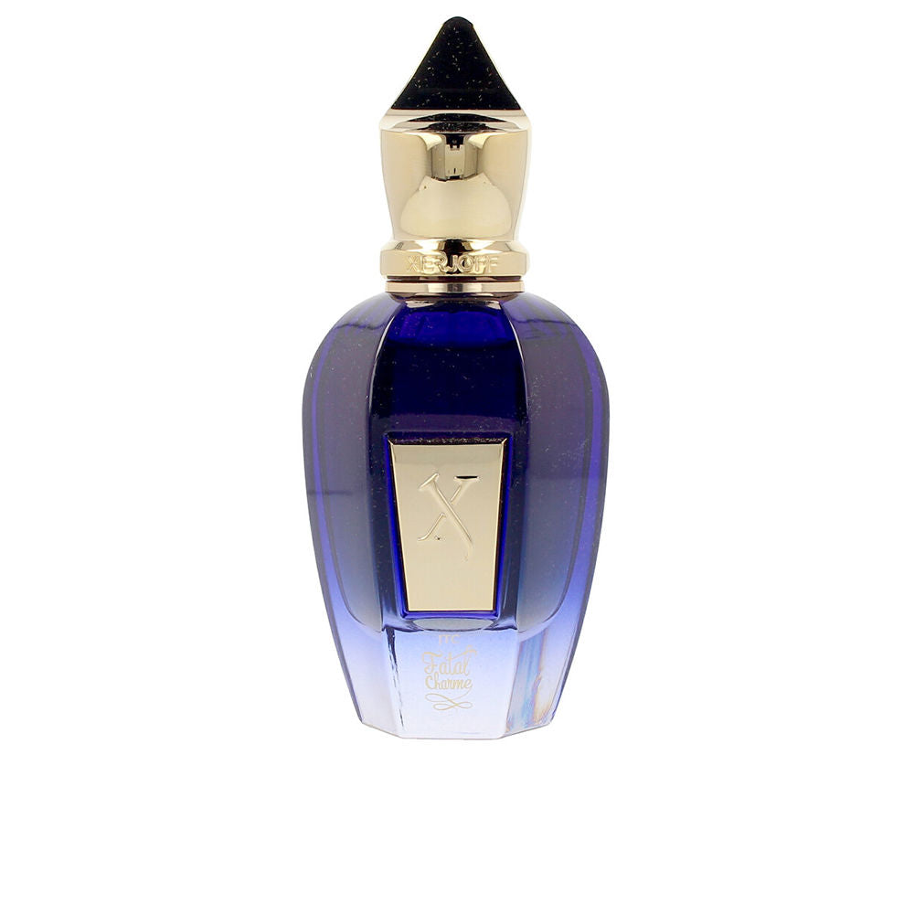 Xerjoff Faceted blue glass perfume bottle with gold cap and label plate, glass and metal craftsmanship