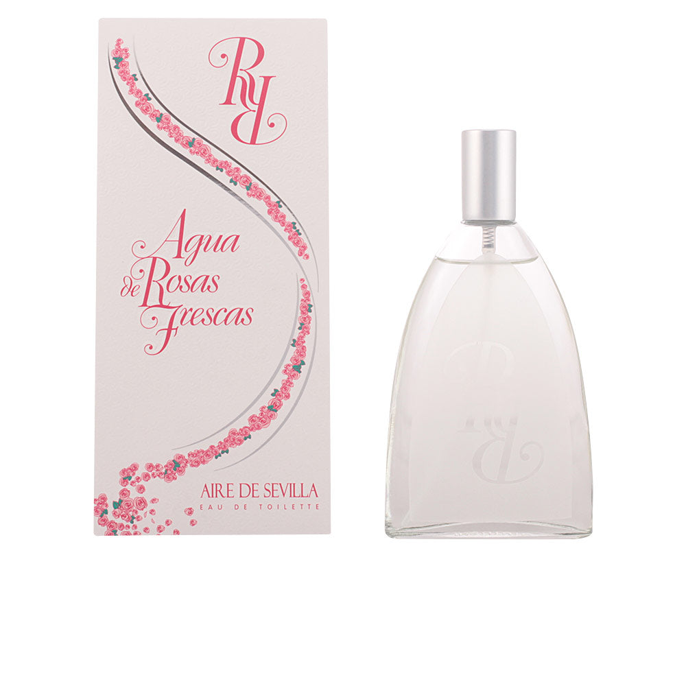 Glass bottle of Aire Sevilla Agua de Rosas perfume evoking a fresh rose garden