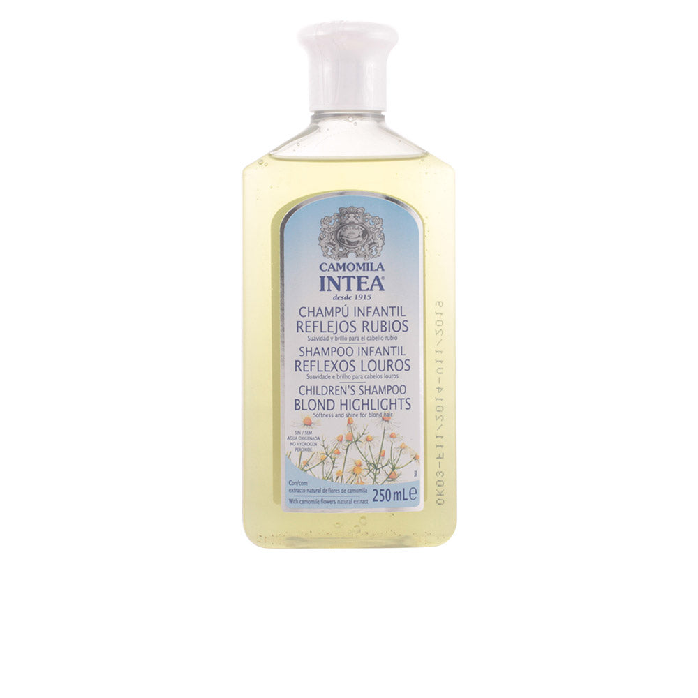 Camomila Intea Light yellow transparent plastic shampoo bottle with white flip-top cap, floral label, simple clean design