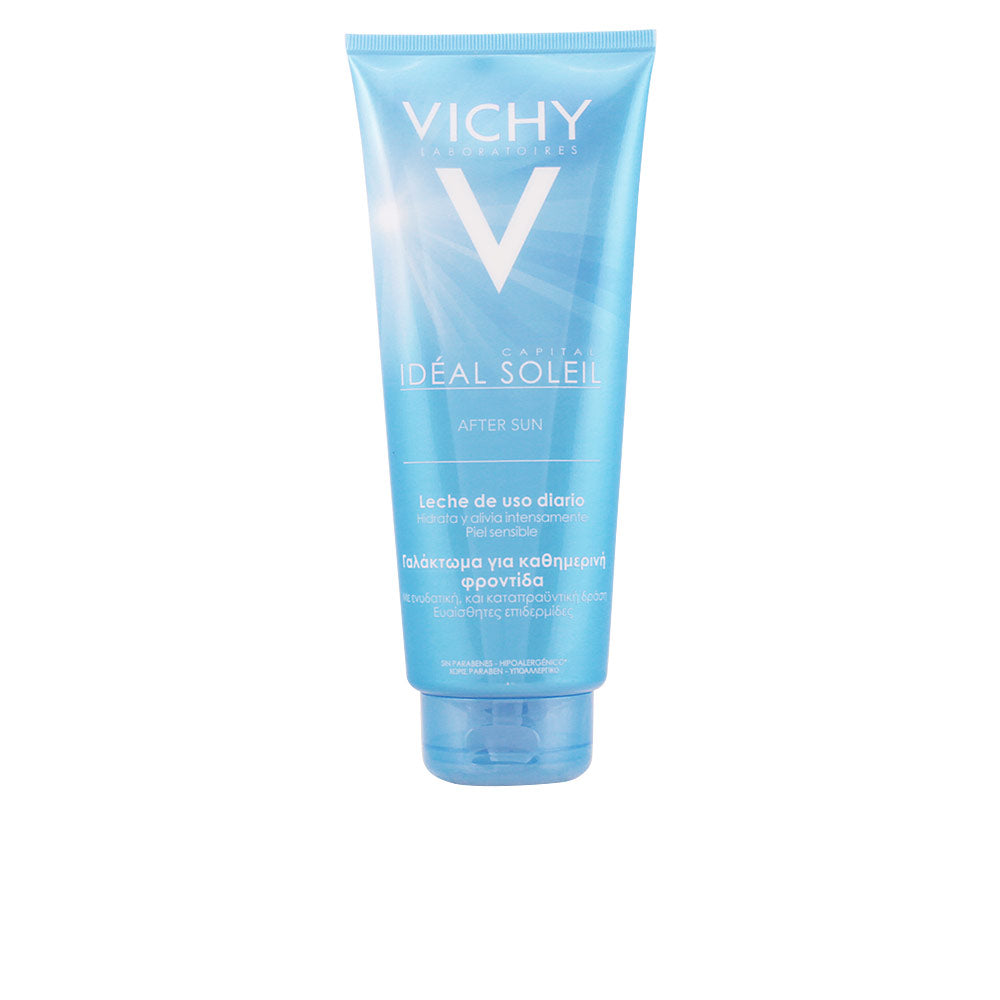 Light blue plastic tube with flip-top cap, white text and logo, multilingual labeling, Vichy