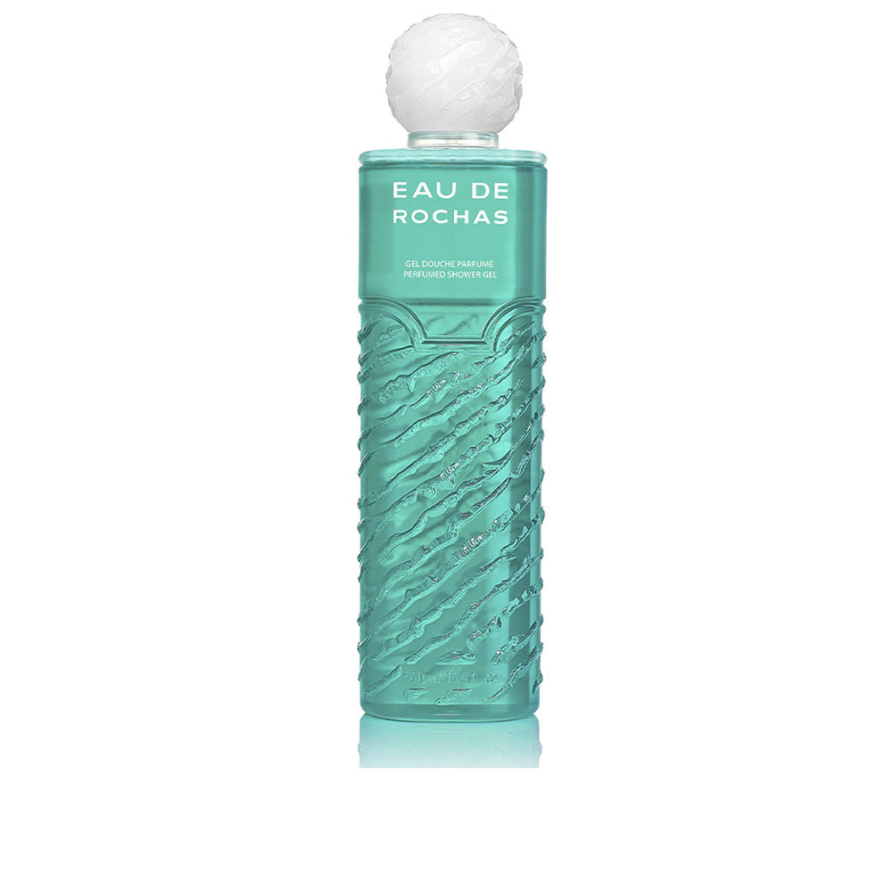 Glass Eau de Rochas bottle with fresh citrus and floral notes, unisex fragrance