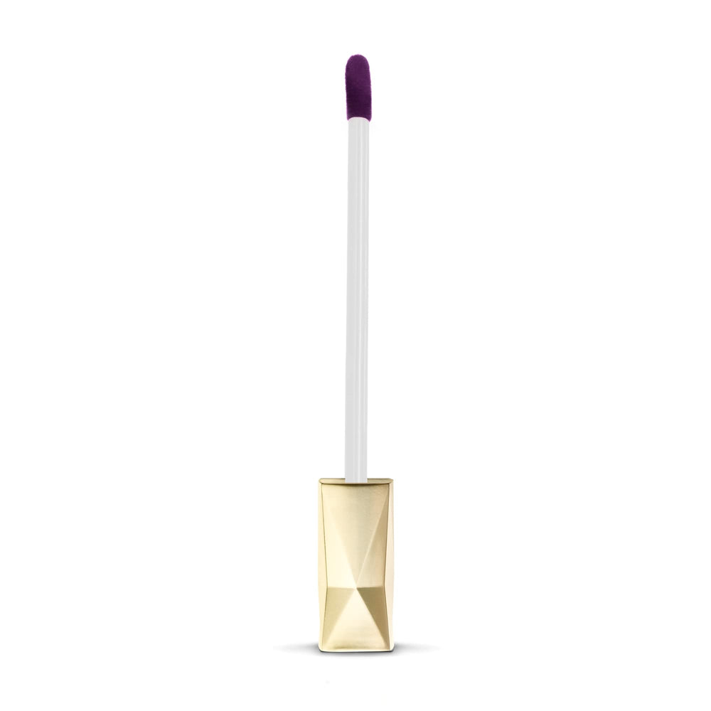 Max Factor Modern plastic lip gloss tube with transparent body, visible purple liquid, geometric gold cap, vertical label