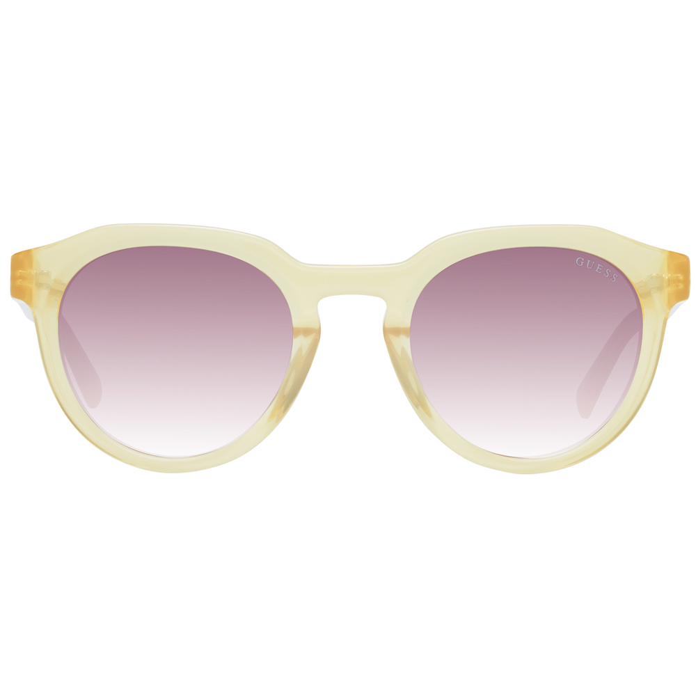 Yellow round sunglasses with purple gradient lenses and Guess logo on lens and temple