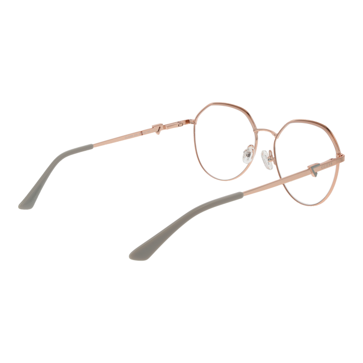 Rose gold thin metal round eyeglasses with adjustable nose pads and white temple tips on neutral background