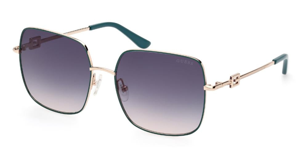 Gold metal square sunglasses with green to purple gradient lenses and decorative temple logo, nose pads visible
