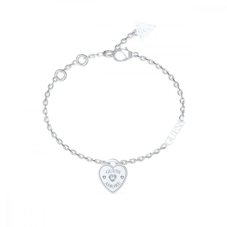 Delicate silver chain bracelet with heart-shaped charm and small round crystal on white background