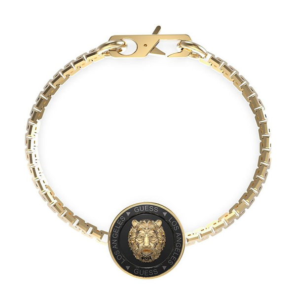 Gold chain bracelet with black accents and lion medallion on circular medallion close-up