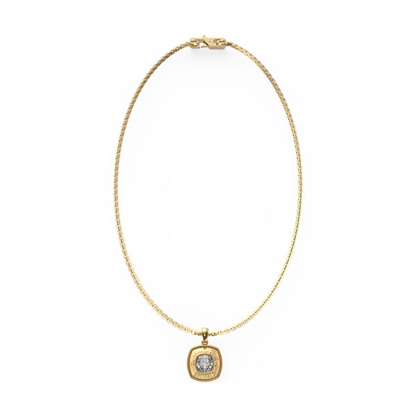 Gold pendant necklace on delicate chain featuring a central clear stone and clasp closure
