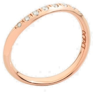 Rose gold ring with embedded diamonds and polished finish shown on neutral background