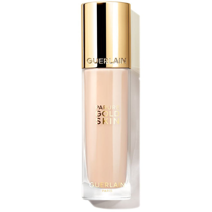 Glass bottle of liquid foundation, beige shade, 35 ml, pump dispenser