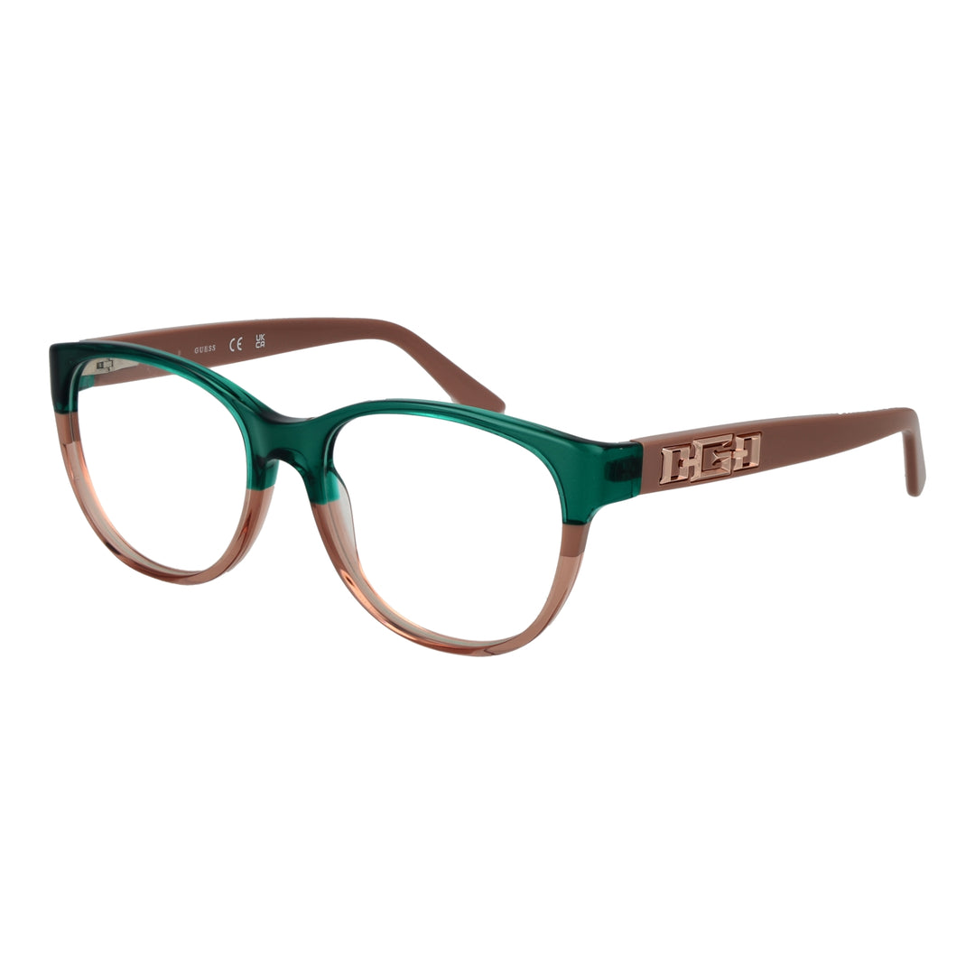 Green and brown two-tone cat-eye eyeglasses in plastic with metal logo on temples, front three-quarter view