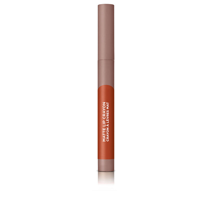 Slim matte lip crayon in warm spice shade, bevelled tip visible, 2.5 g