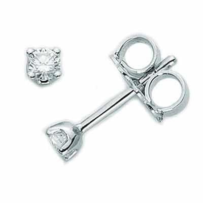 Pair of silver metal stud earrings each featuring a single round clear diamond in a four-prong setting